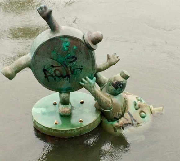 RIOC Board Frustrated with History of Bad Contracting Tom Otterness's graffiti scarred sculpture in the East River.